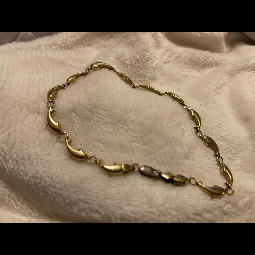 Gold dolphin ankle bracelet 10.5”